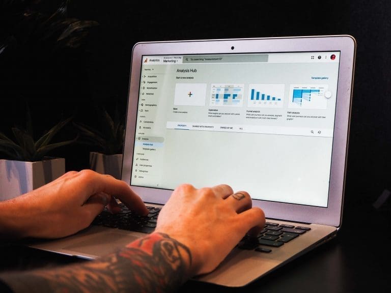 Google Analytics 4 on a Laptop Where a Person is Working