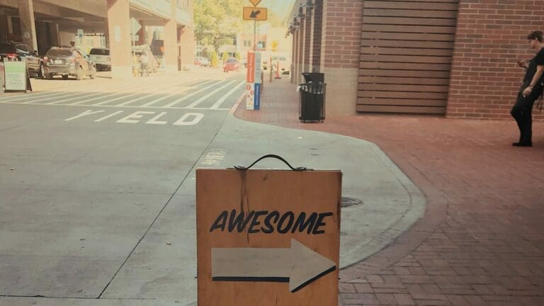 awesome sign on wood on the street