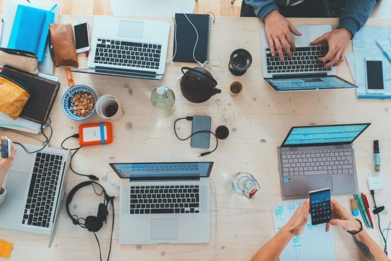 co working and some computers on table