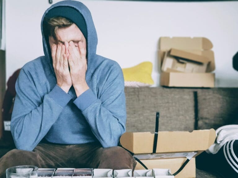 stress guy sit down